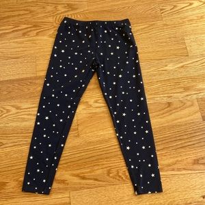Pair of black/navy blue pants with white stars for kids
